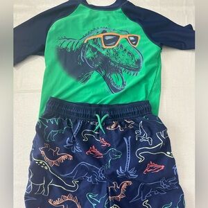 Boys size 12 Carters Swim Set. rash guard + swim shorts for Dino loving boys! 🦖